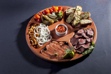 variety of fish, vegetables and meats