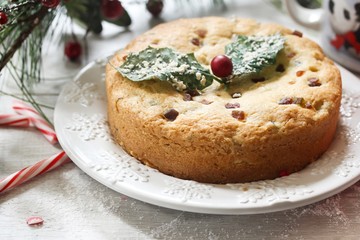 Christmas cake with candied dry fruits, selective focus