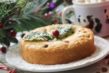 Christmas cake with candied dry fruits, selective focus