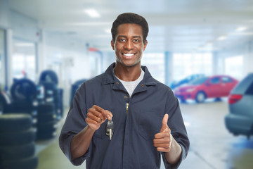 Car mechanic with key.