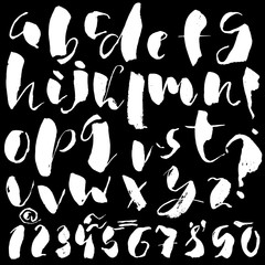 Hand drawn font made by dry brush strokes. Grunge style alphabet
