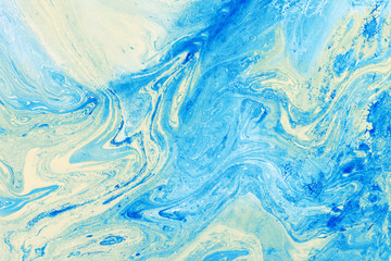 Fototapeta na wymiar Blue marbling texture. Creative background with abstract oil painted waves handmade surface. Liquid paint.