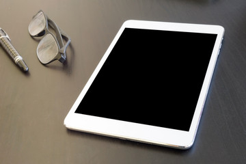 Tablet touch computer gadget with touch blank screen on the desk