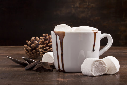 Hot chocolate cup with chocolate and marshmallows.