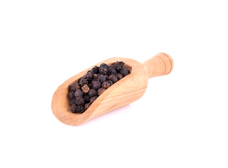 Black pepper on white background