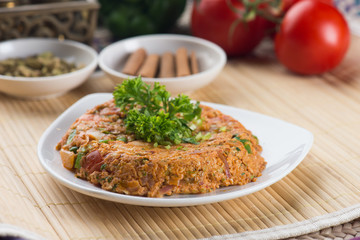 oqda , fried potatoes with meat popular arab food