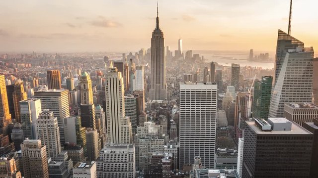 Aerial view of Manhattan skyline. Zoom in. Sunset. Vintage. Time lapse.