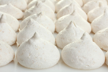 Fototapeta na wymiar Coconut meringue on a white background.