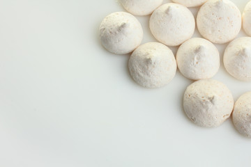 Coconut meringue on a white background.