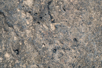 little holes on the black stone