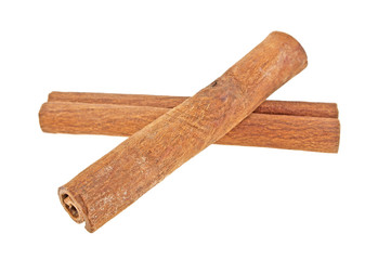 Two cinnamon sticks isolated on white background
