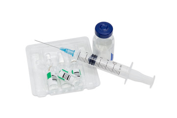 Plastic medical syringe with hypodermic needle and pharmaceutical products ampules