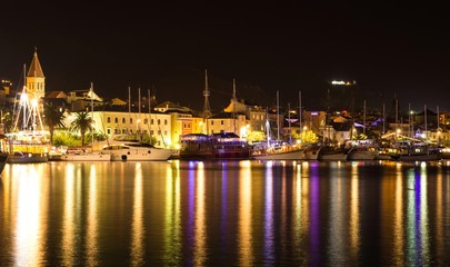 Fototapeta na wymiar Beautiful night landscape of Makarska city, popular resort in Croatia