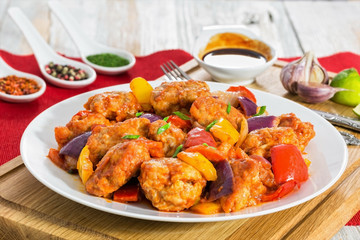 Sweet and Sour crispy fried pork pieces