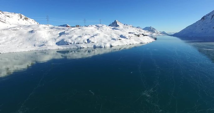 Lago Bianco ghiacciato - Passo del Bernina in Inverno - Aerial view 4k