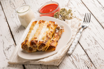 ragout cannelloni with oregano
