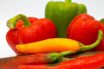 Red ,Green and Yellow peppers isolated on white background