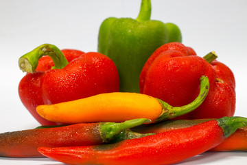 Red ,Green and Yellow peppers isolated on white background