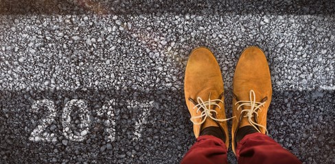 Composite image of close-up of person wearing shoes 