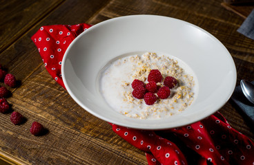 dish of oatmeal and a cup of coffee