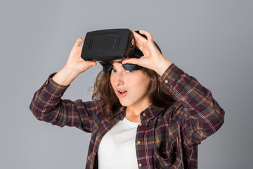 young girl testing virtual reality glasses