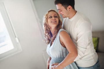 Fototapeta premium Happy couple expecting newbord