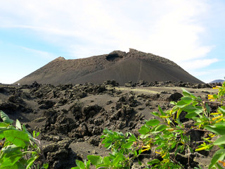 Hiking on volcanic lands (Lanzarote, Canary Islands, Spain). Visit to 