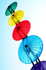 Fototapeta na wymiar umbrella on blue sky