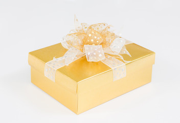 Gold Christmas gift box on white background