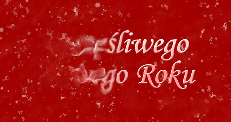 Happy New Year text in Polish "Szczesliwego Nowego Roku" turns to dust from bottom on red background