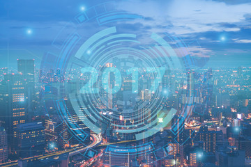 2017 Smart city. double exposure of night cityscape with technol
