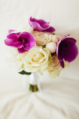 wedding bouquet orchids and peonies