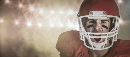 Composite image of portrait of rugby player screaming