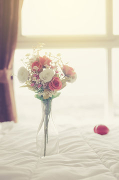 Beautiful flower and towels decoration on bedroom - Filter effec