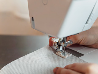 the needle of the sewing machine