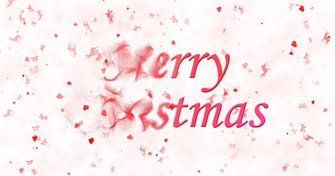 Merry Christmas text turns to dust from left on white background