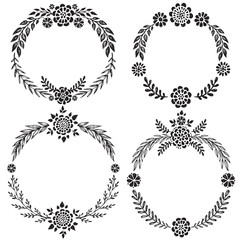 Set of hand drawn vector floral wreaths with leaves, flowers.
