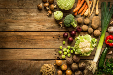 Autumn (fall) vegetables on vintage wooden background