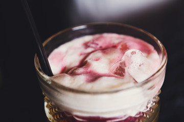 Creative cocktail in night club bar background