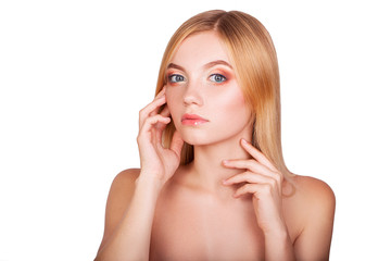 Fototapeta premium Beautiful young sexy girl on a white background, model, makeup