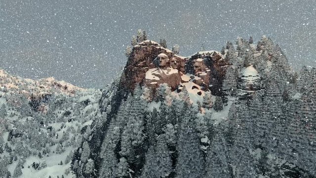 Mount Rushmore In Winter, Snowing, Camera Fly