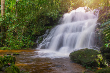 beautiful waterfall in rainforest at phu tub berk mountain  phet