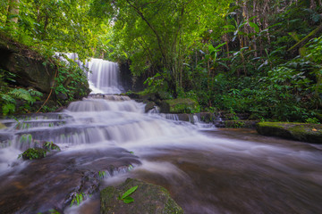 beautiful waterfall in rainforest at phu tub berk mountain  phet