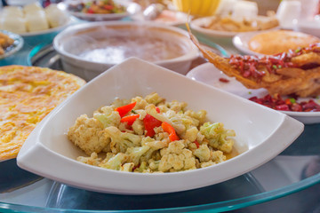 Huge amount of food on the table for Dinner time or lunch in res