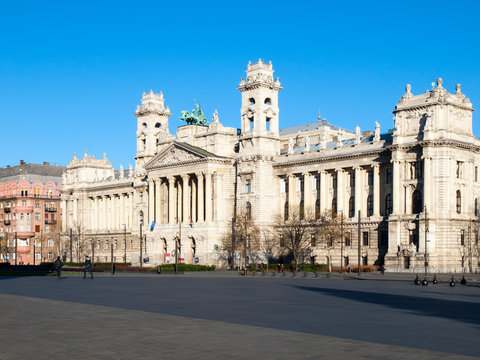 Hungarian National Museum of Ethnography, aka Neprajzi Muzeum, at Kossuth Lajos Square in Budapest, Hungary, Europe. View of entrance portal with two towers and architectural columns on sunny day with