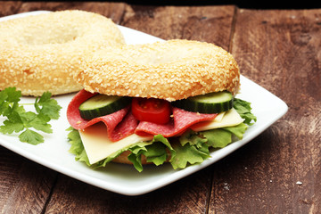 Delicious bagel sandwich on the table