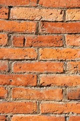 Viejo muro de ladrillos irregulares