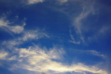 Naklejka na ściany i meble Beautiful sky with clouds at sunset or sunrise