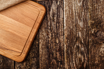 Background with wooden board over grunge background.