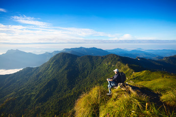 Tourist at the top of the mountain at beautiful view of Phu chi fa in Chiang rai, Thailand